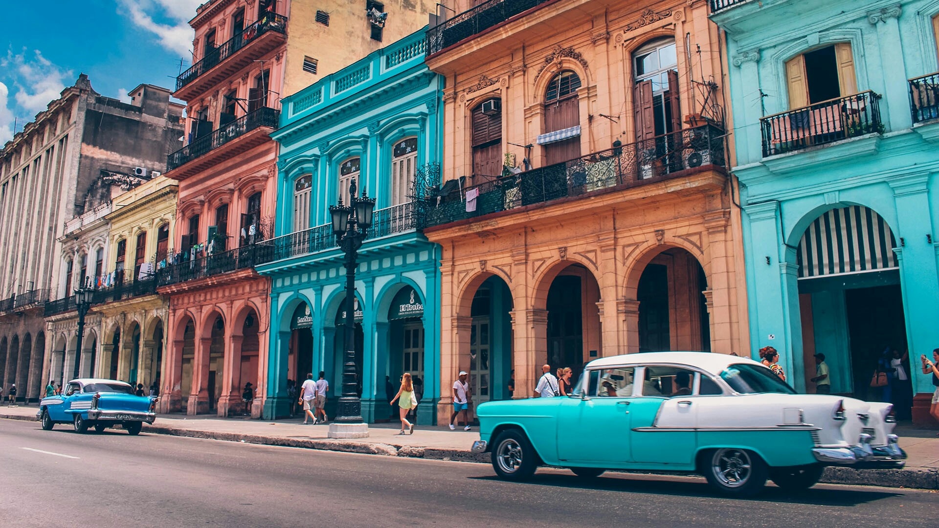 Classic convertible in colonial Havana at sunset