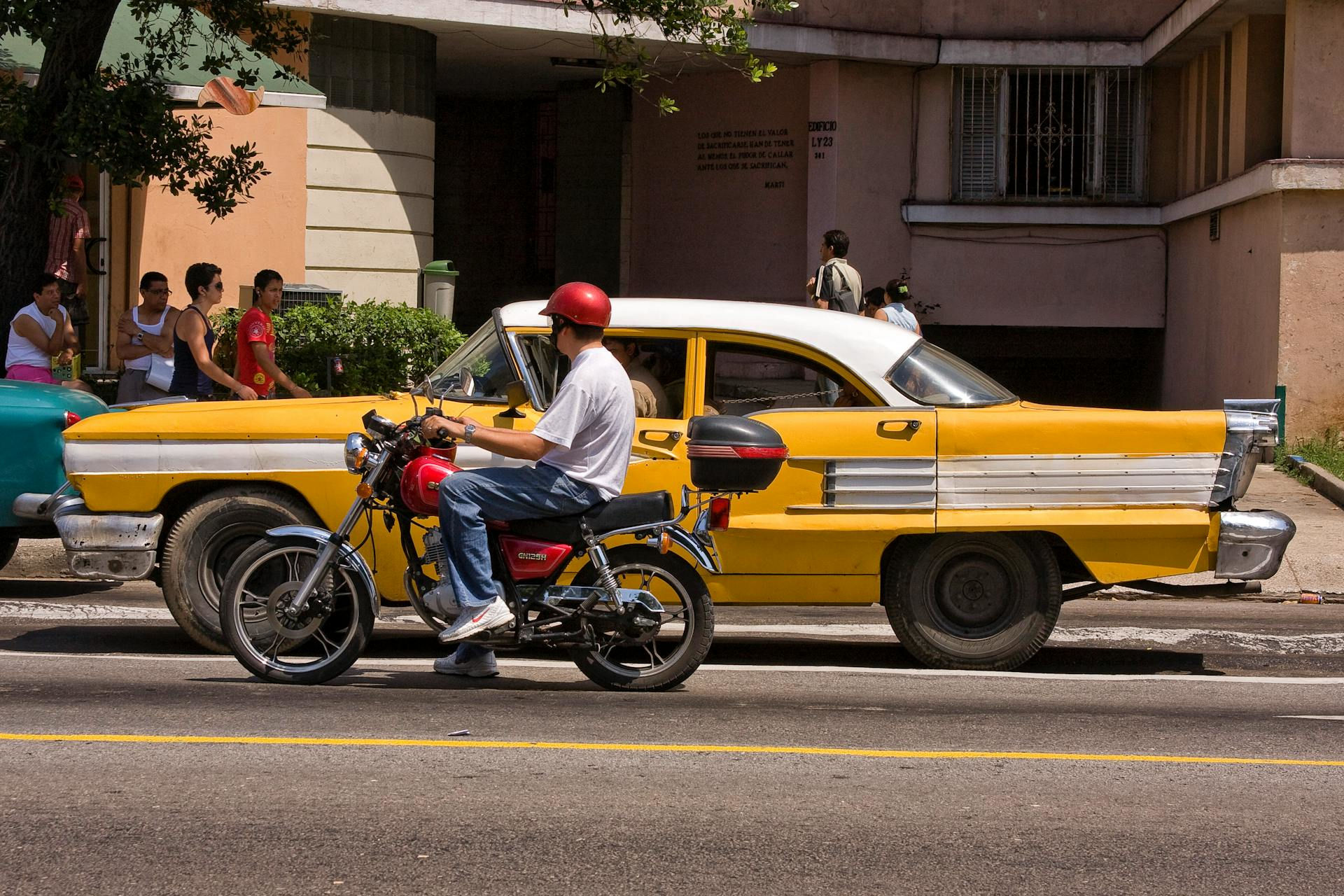 Classic convertible in colonial Havana at sunset