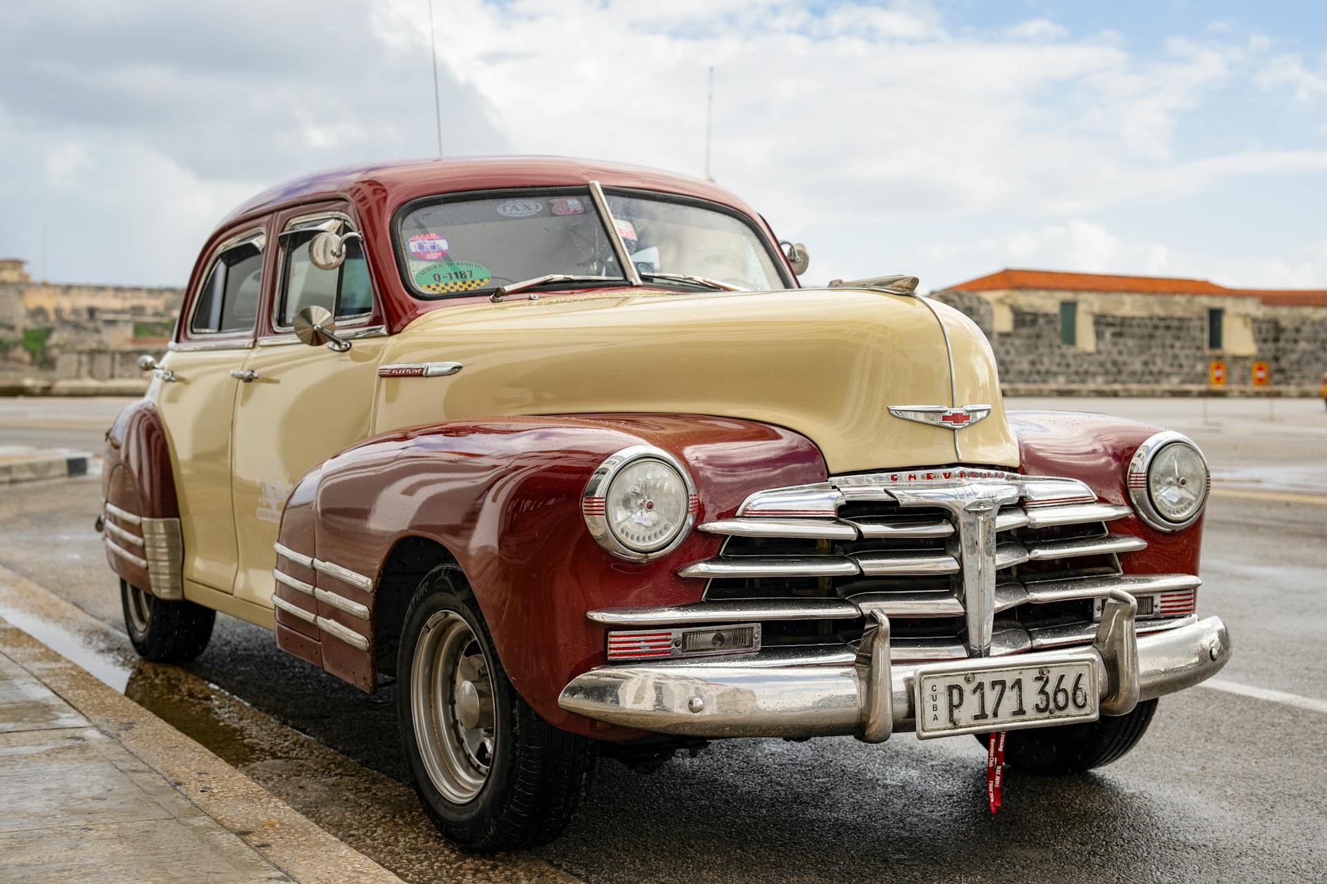 Classic car in colonial Havana at sunset